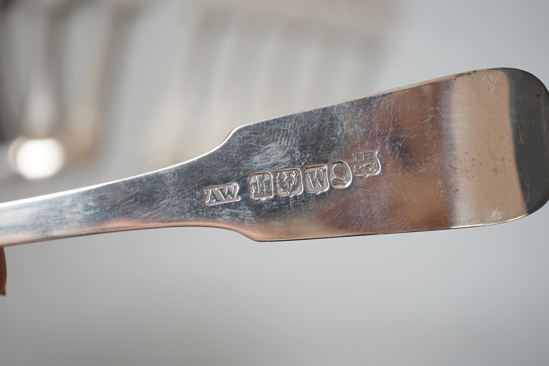 A harlequin set of six Georgian Scottish silver fiddle pattern table forks and a similar harlequin set of six Old English fiddle pattern table spoons, 24.1oz.